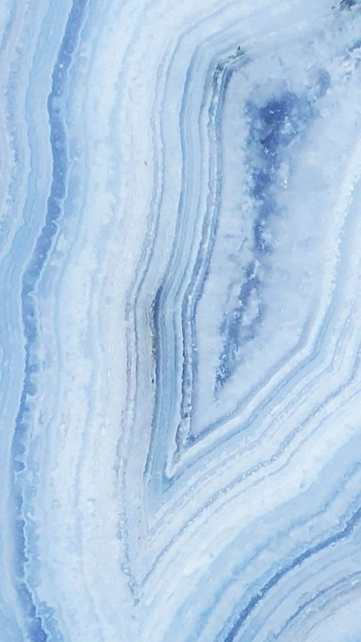 Blue lace agate with pale blue banding and airy calming light.
